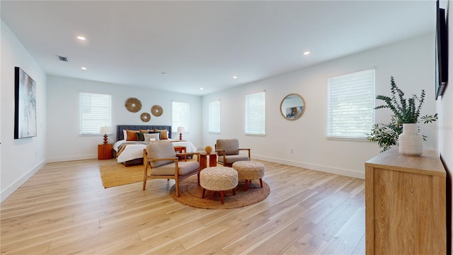 bedroom with light hardwood / wood-style flooring