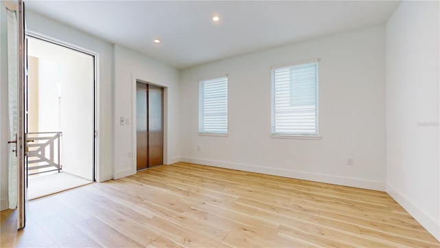 unfurnished bedroom featuring light hardwood / wood-style flooring