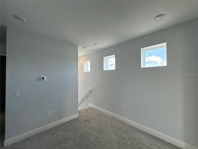 interior space with a textured ceiling