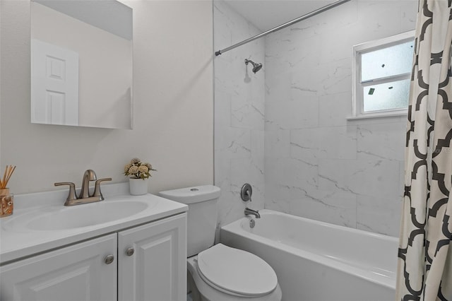 full bath featuring shower / bath combination with curtain, vanity, and toilet