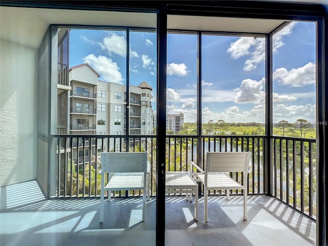 unfurnished sunroom with a healthy amount of sunlight