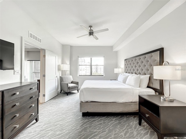 bedroom with ceiling fan and carpet floors