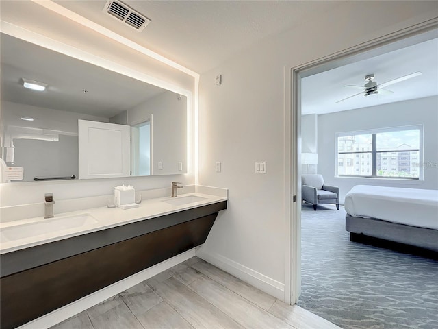 bathroom featuring dual vanity and ceiling fan