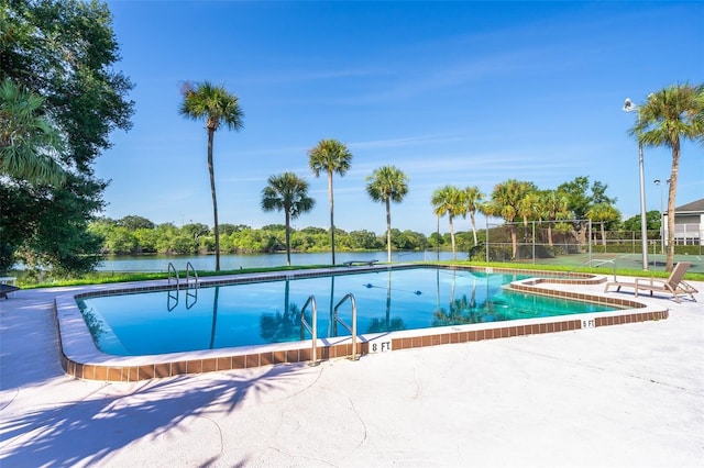 view of pool featuring a patio