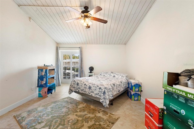 bedroom with wooden ceiling, ceiling fan, and tile floors