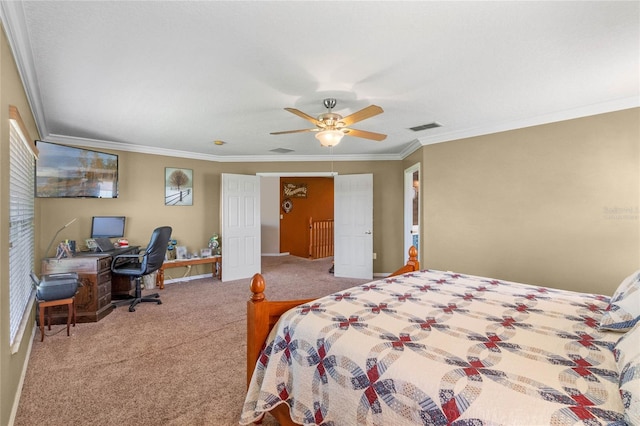 carpeted bedroom featuring ceiling fan and ornamental molding