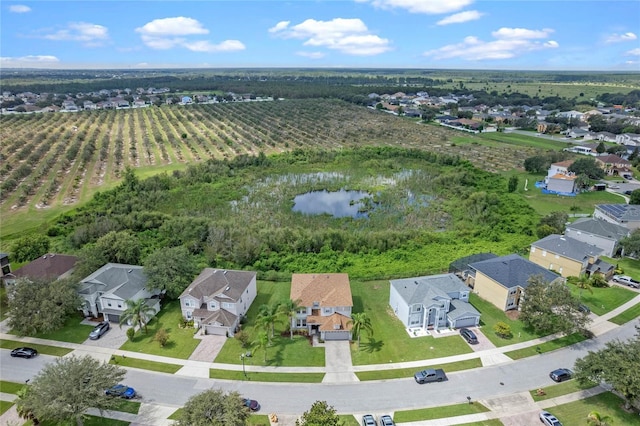 aerial view featuring a water view and a rural view