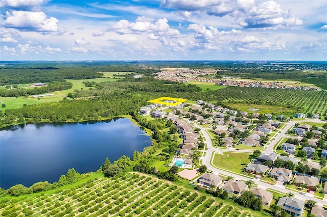 drone / aerial view featuring a water view and a rural view