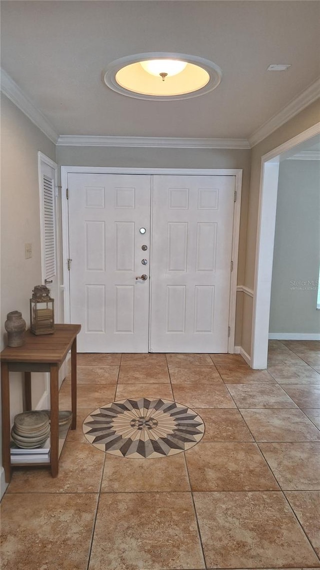 1030 Gregory Dr, Maitland, FL 32751 - foyer entrance with ornamental molding, baseboards, and light tile patterned floors