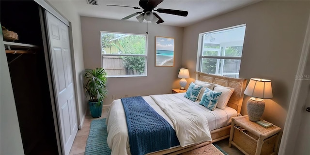 1030 Gregory Dr, Maitland, FL 32751 - bedroom featuring visible vents, multiple windows, and a ceiling fan