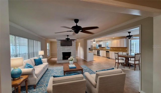 1030 Gregory Dr, Maitland, FL 32751 - living area with light tile patterned floors, a stone fireplace, ornamental molding, and ceiling fan