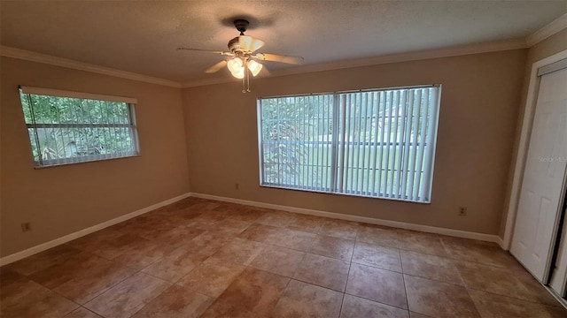 1030 Gregory Dr, Maitland, FL 32751 - tiled spare room with baseboards, ornamental molding, and ceiling fan