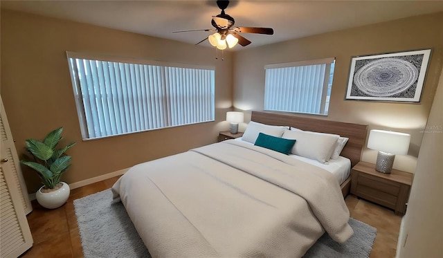 1030 Gregory Dr, Maitland, FL 32751 - bedroom featuring baseboards and a ceiling fan