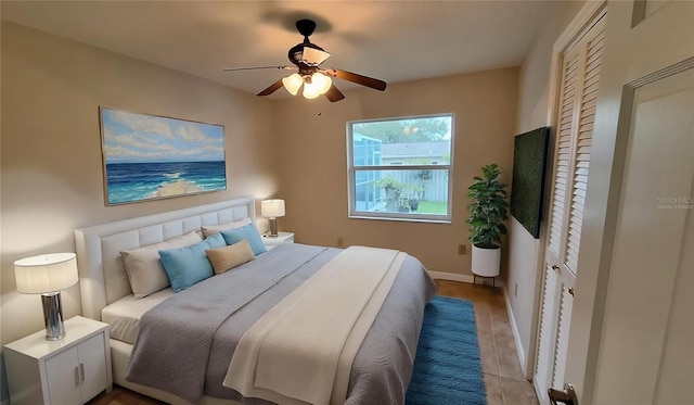 1030 Gregory Dr, Maitland, FL 32751 - bedroom featuring baseboards and a ceiling fan