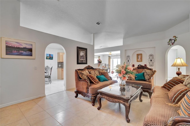 living room featuring light tile flooring