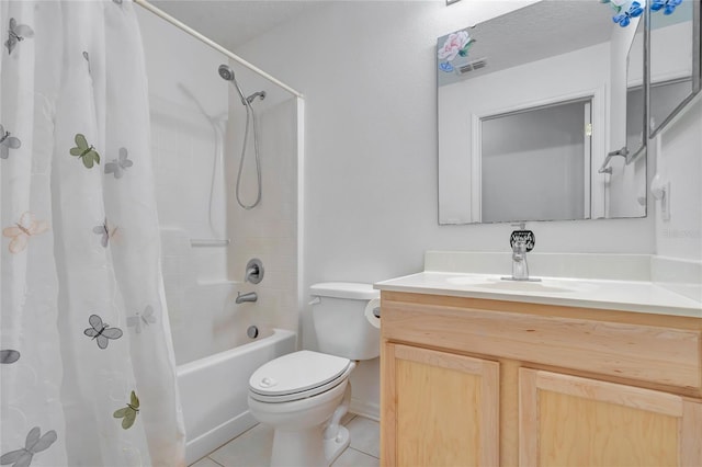 full bathroom featuring tile floors, shower / bath combo with shower curtain, toilet, and vanity