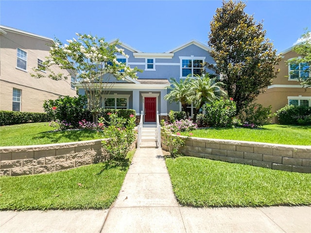 view of front of home with a front yard