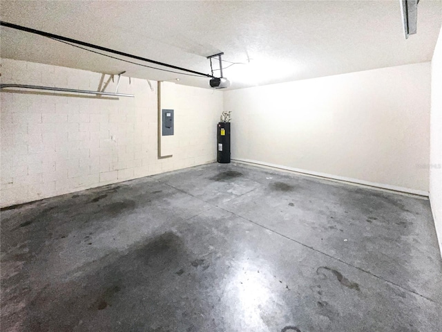 garage with electric water heater, electric panel, and a garage door opener