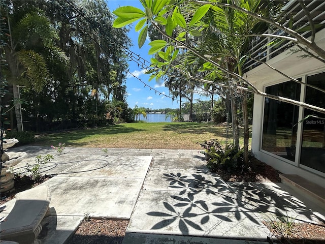 view of patio / terrace featuring a water view