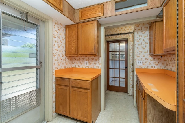 kitchen featuring light tile patterned flooring