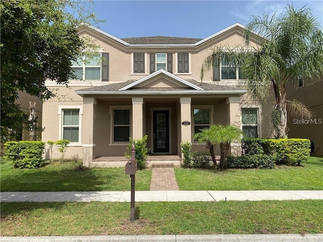 view of front of property featuring a front yard