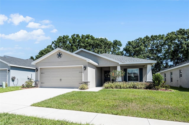 view of front of property with a front lawn and a garage