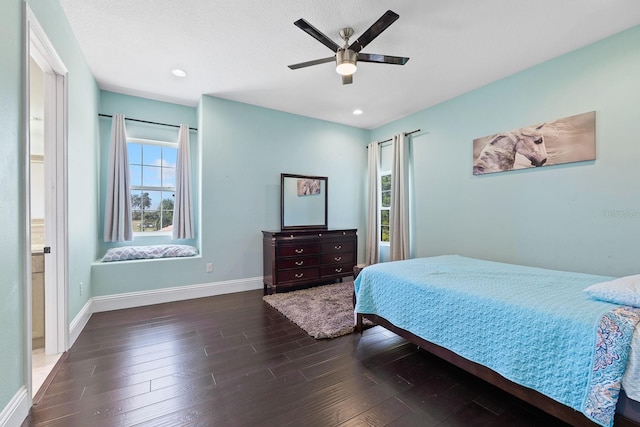 bedroom with wood-type flooring and ceiling fan