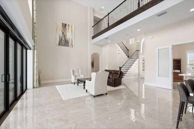 interior space with a towering ceiling