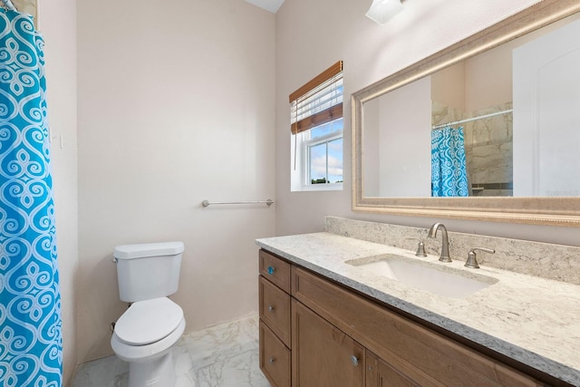 bathroom featuring vanity, tile patterned flooring, and toilet