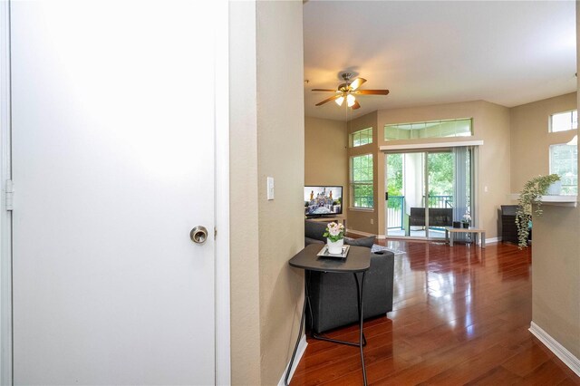 corridor featuring hardwood / wood-style floors