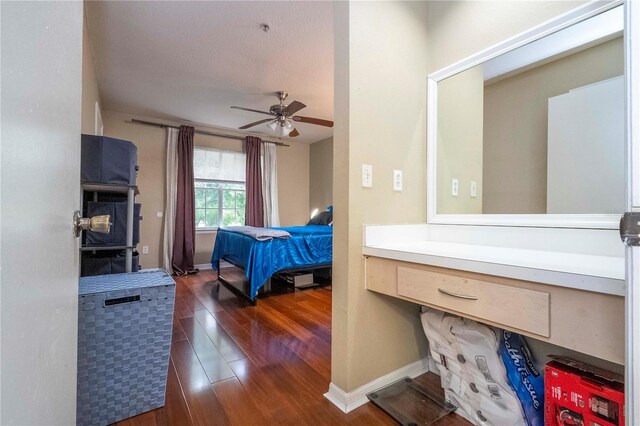 bedroom featuring dark hardwood / wood-style floors and ceiling fan