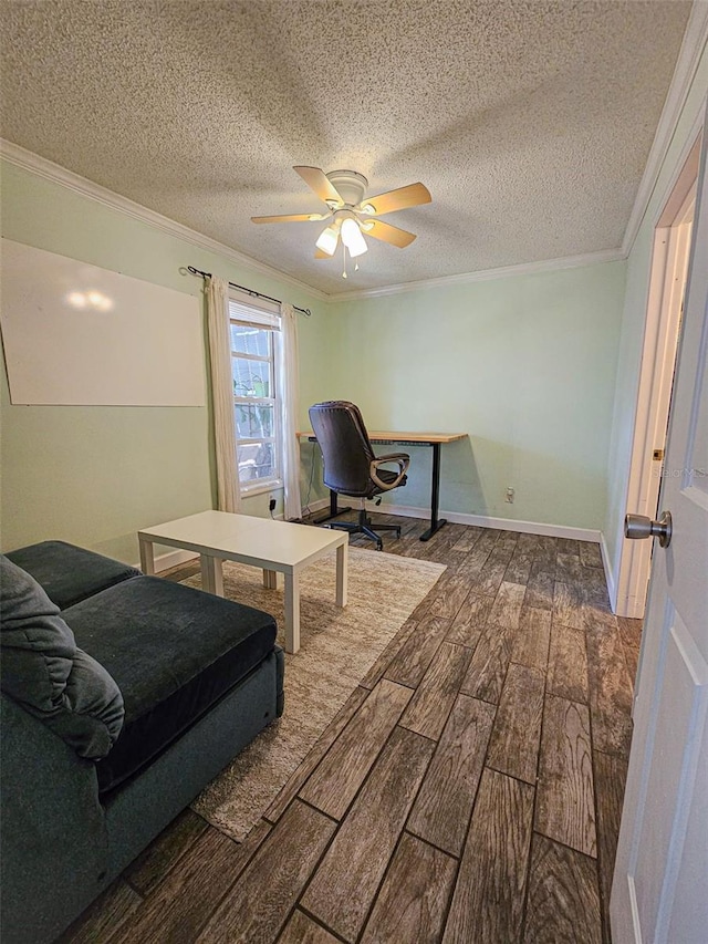 bedroom featuring a textured ceiling, ceiling fan, and ornamental molding