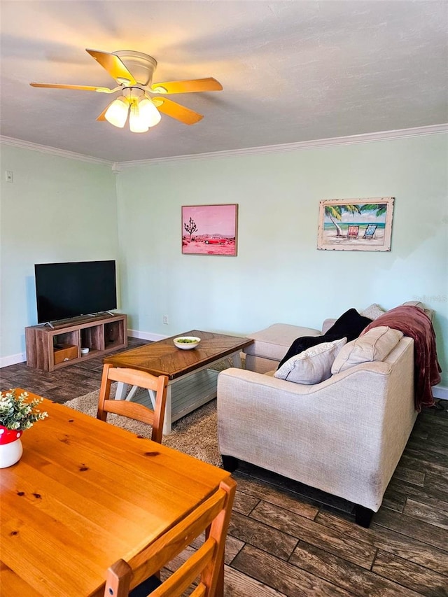 living room featuring ceiling fan and ornamental molding