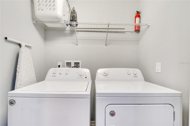 clothes washing area with independent washer and dryer and hookup for a washing machine