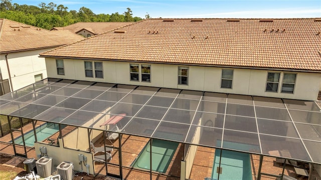 view of building exterior featuring cooling unit