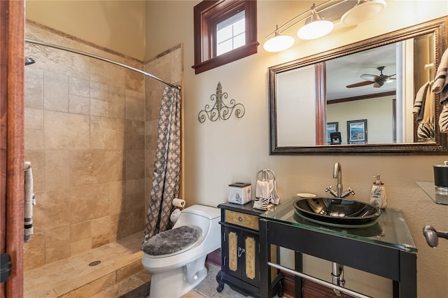 bathroom with ceiling fan, sink, walk in shower, crown molding, and toilet