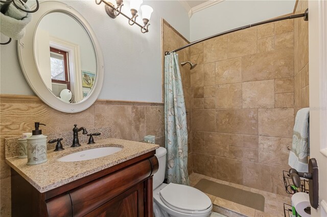 bathroom featuring toilet, vanity, tile walls, and walk in shower