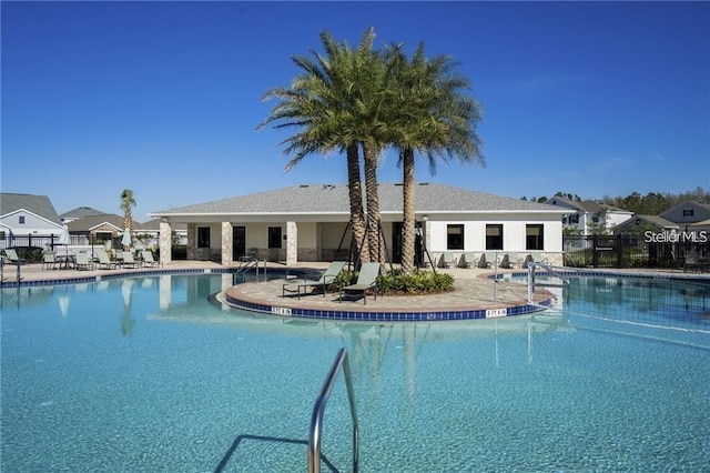 view of pool featuring a patio