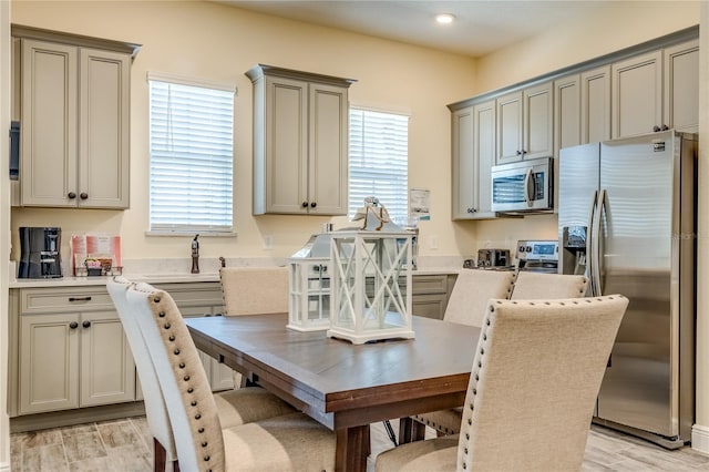 dining room with light hardwood / wood-style flooring