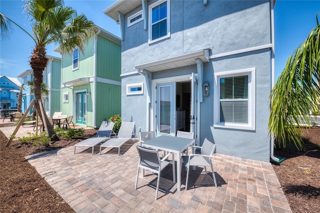 rear view of property with a patio area