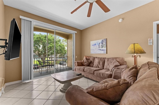 living room with light tile patterned floors and ceiling fan