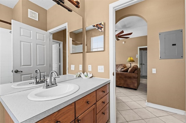 bathroom featuring vanity, tile patterned floors, electric panel, and ceiling fan