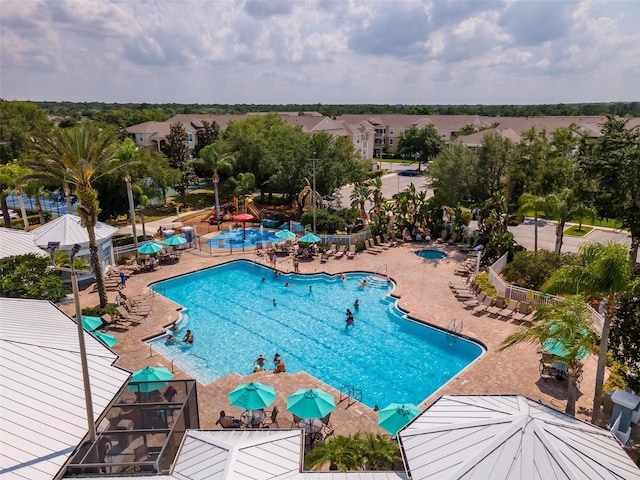 view of swimming pool featuring a patio