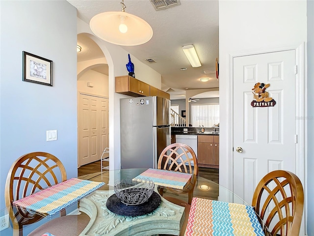 dining area featuring hardwood / wood-style floors