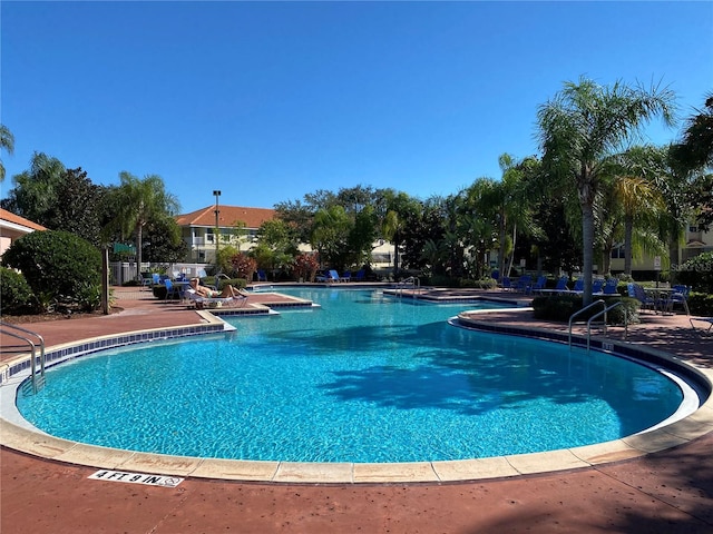 view of pool featuring a patio area