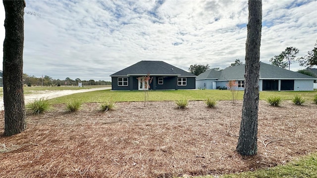 exterior space with a front lawn