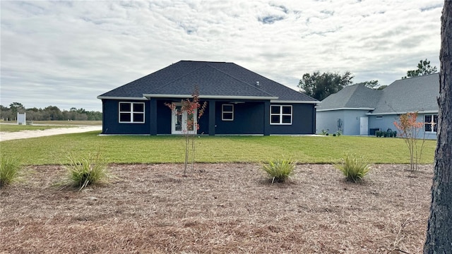 view of front of house with a front lawn