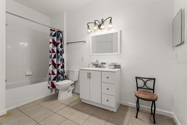 full bathroom featuring tile flooring, toilet, shower / tub combo with curtain, and large vanity