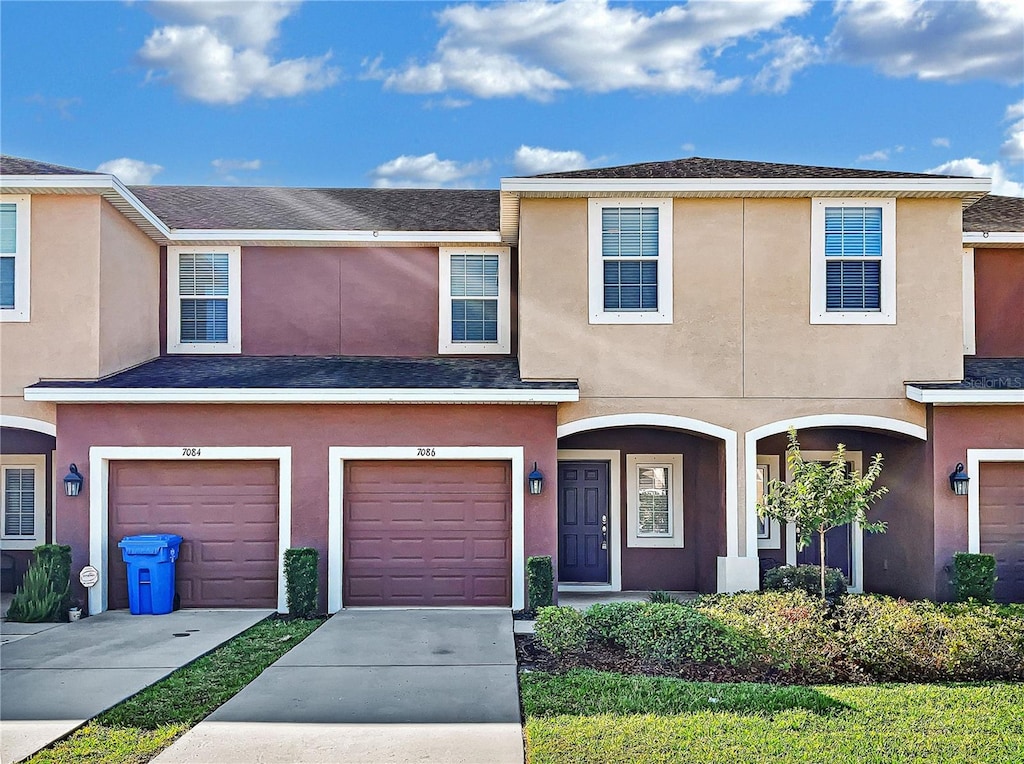 view of property featuring a garage