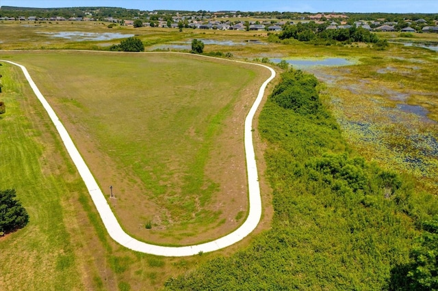 aerial view featuring a rural view and a water view